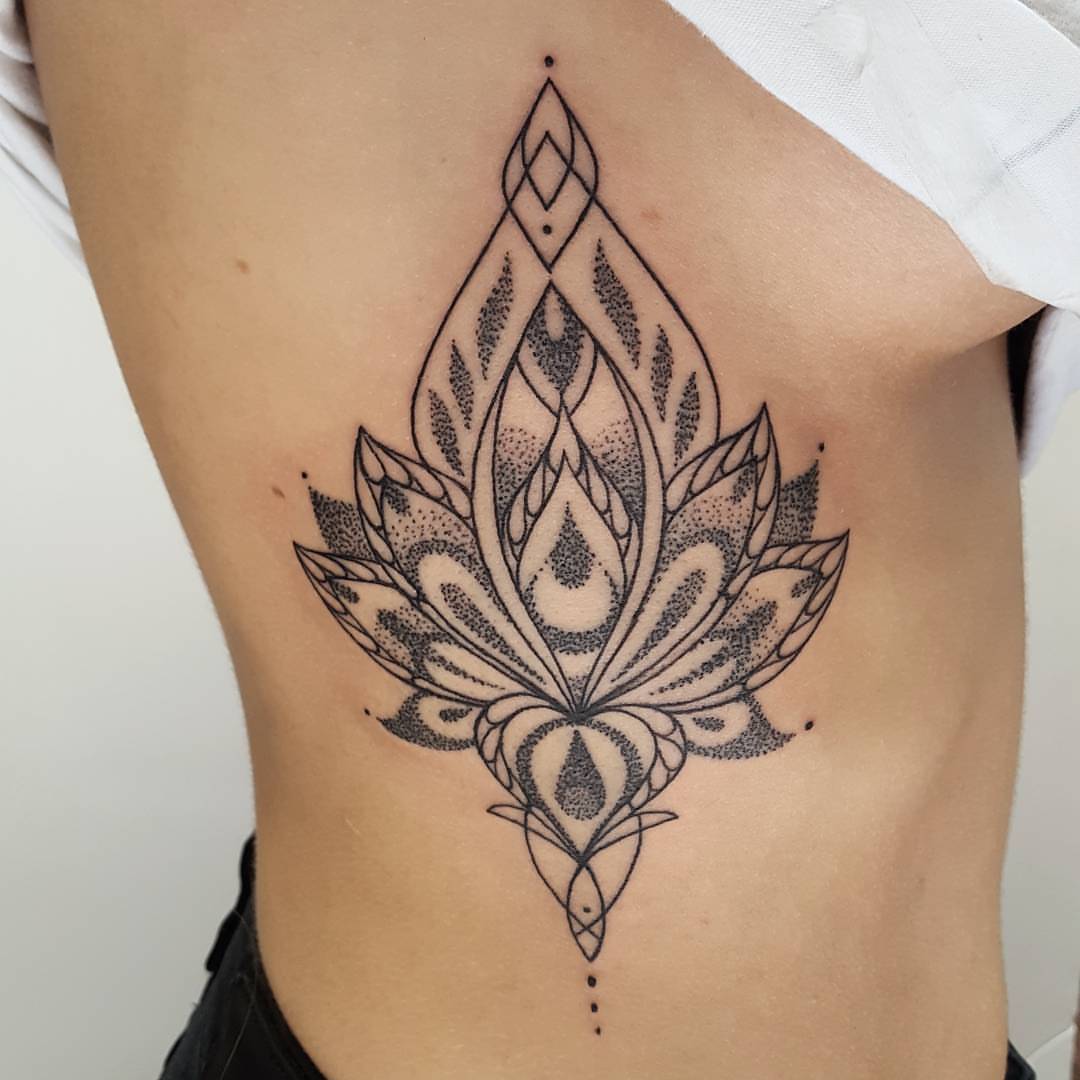 Freehand dotwork on my ankle, and finished thickening the petals of my lotus  sternum tattoo. Insta: @purrific_pokes : r/handpoke